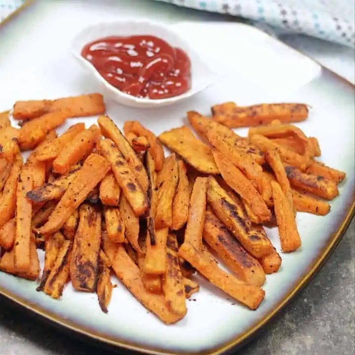 close up of sweet potato fries in a plate