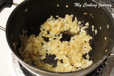 Sautéing the onions till they are translucent