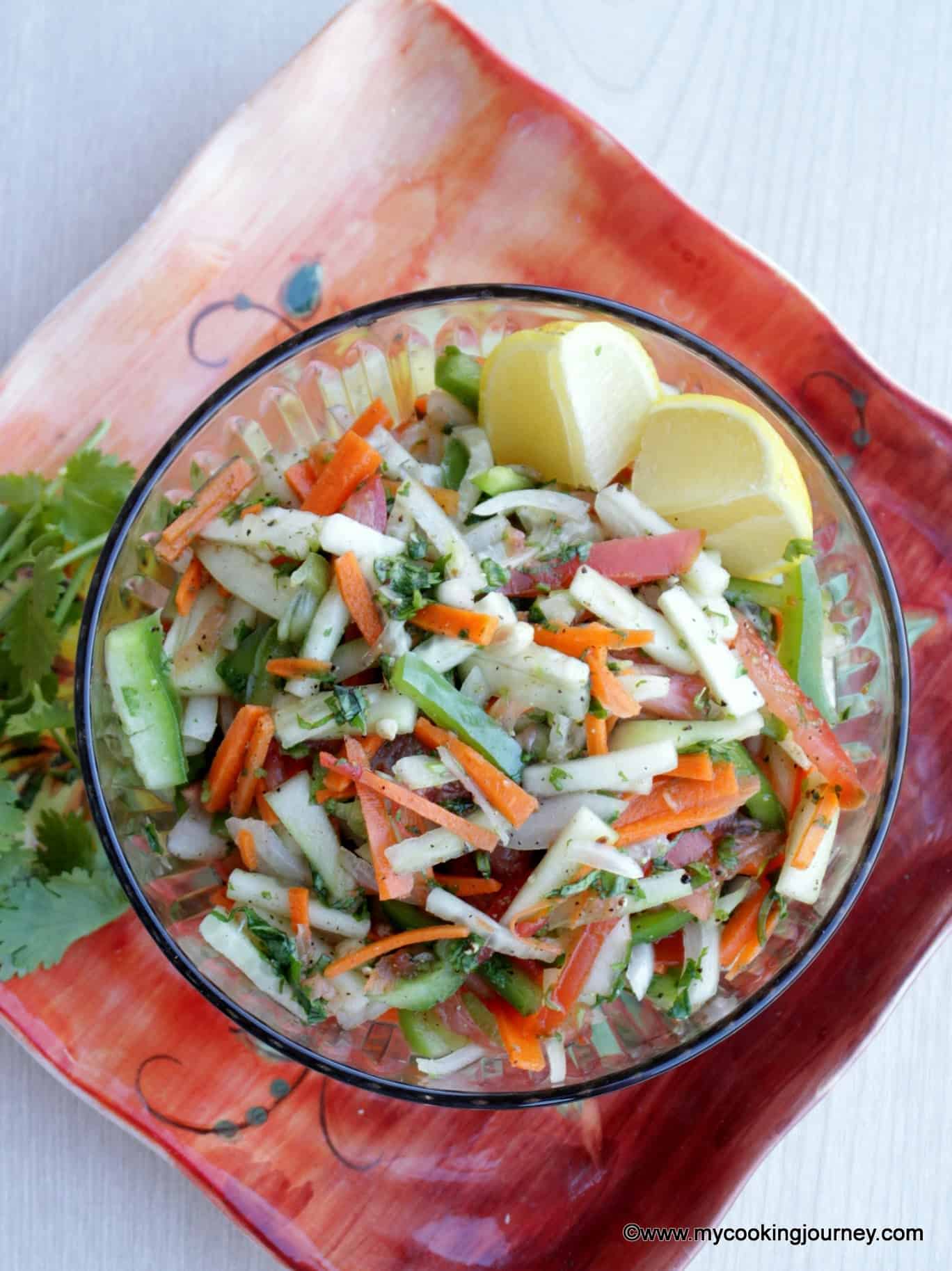 Kachumber salad in a glass bowl