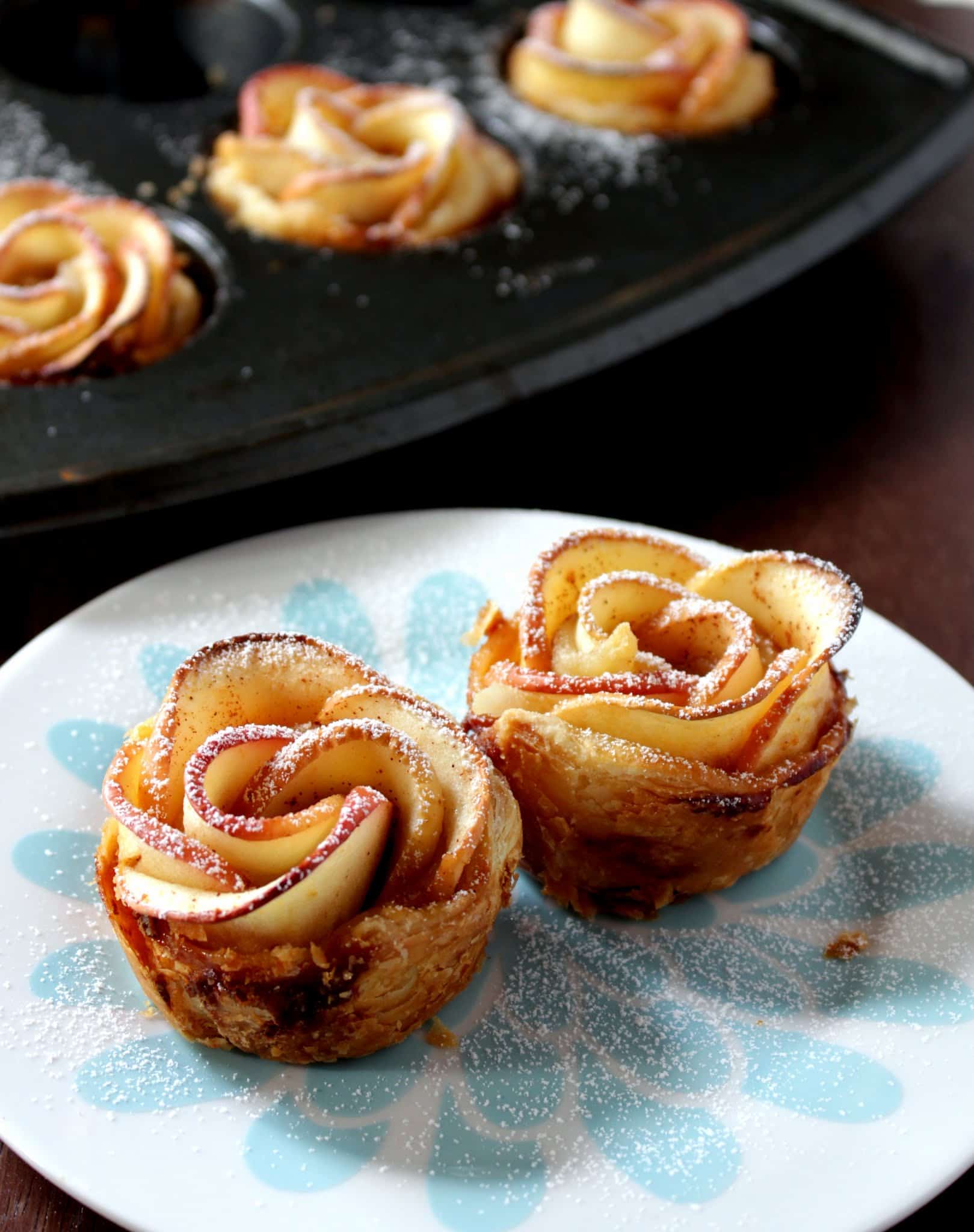 close up shot of Apple Roses sprinkled with powdered sugar