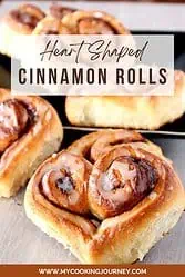 heart shaped cinnamon rolls with text overlay.