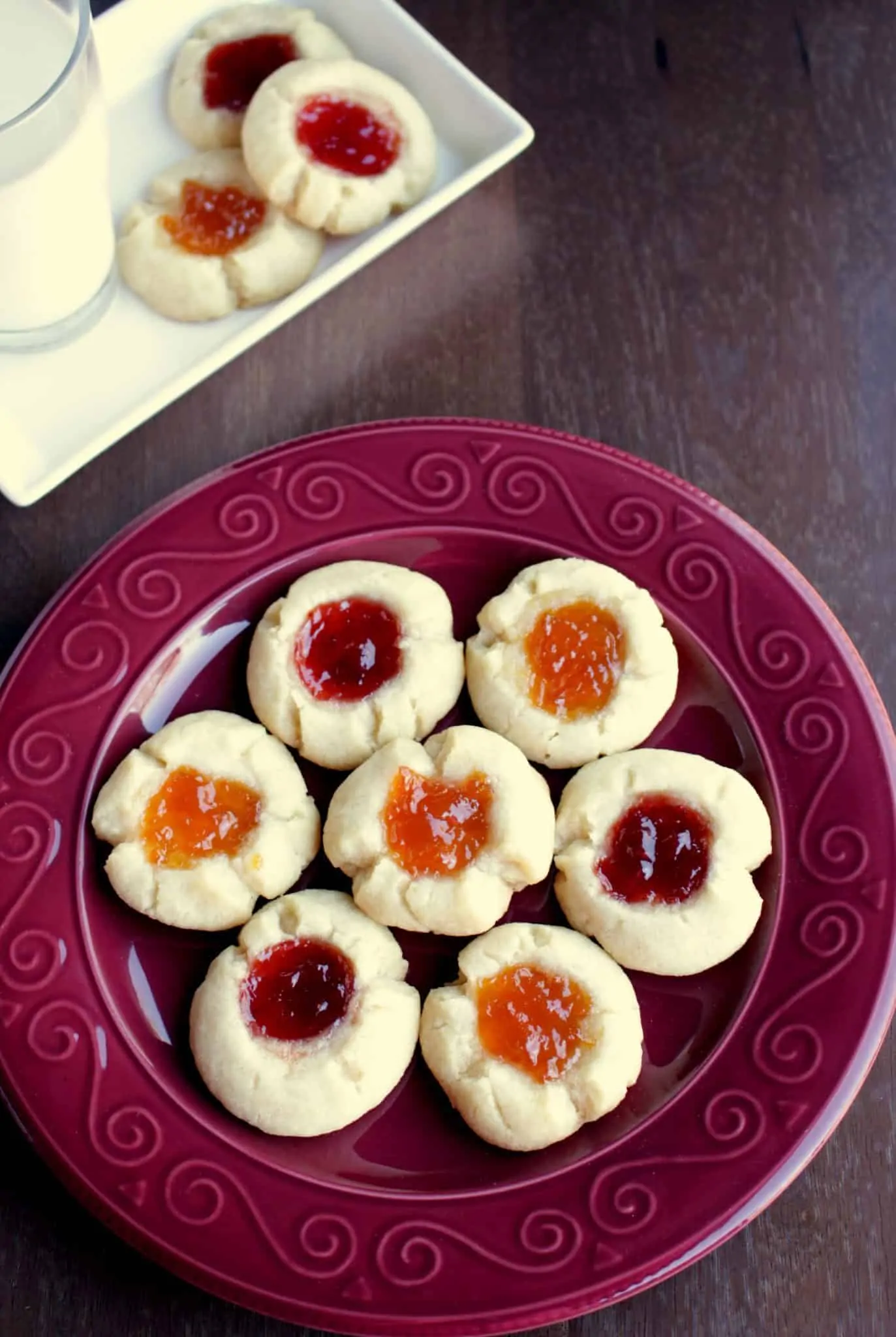 Jam Thumbprint Cookies in a red and white plates - Top view