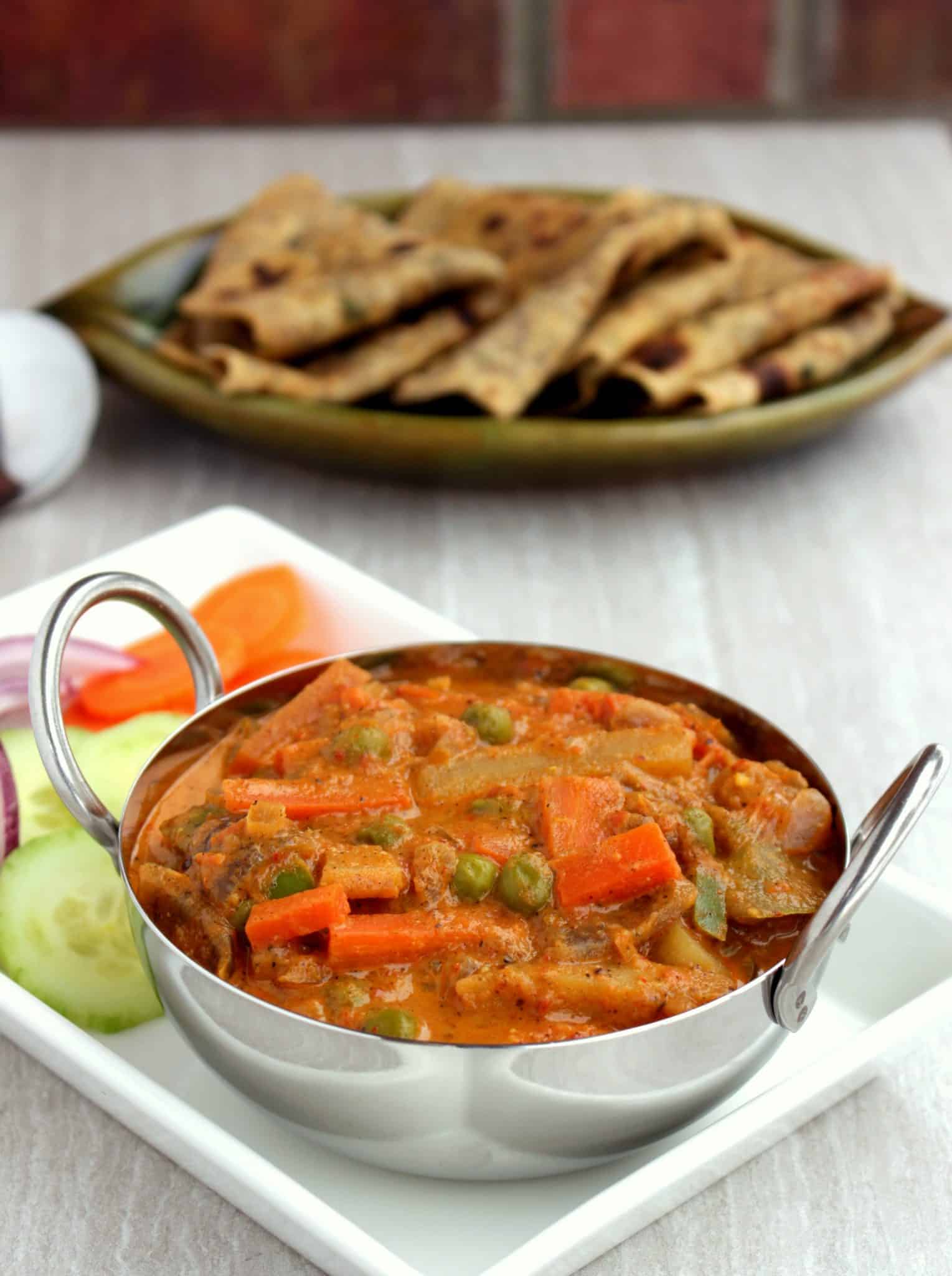 Kadai Vegetable Gravy with cucumber, carrot, Onion and roti on the side