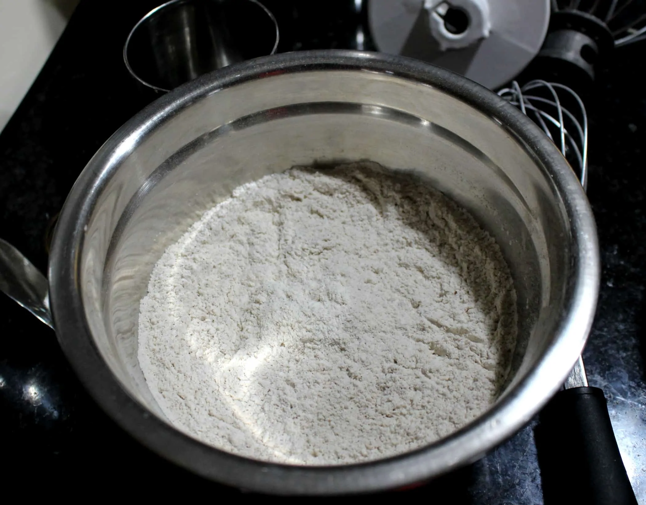 Adding the dry ingredients in a bowl
