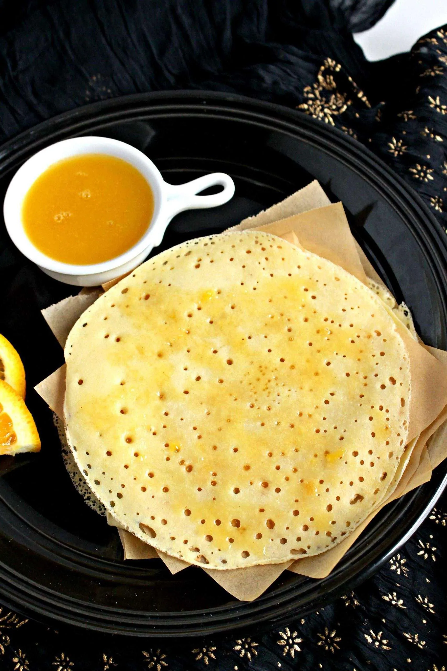 Baghrir with Orange Butter Sauce on the side