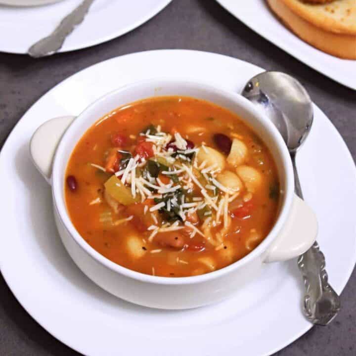 minestrone soup with cheese on top