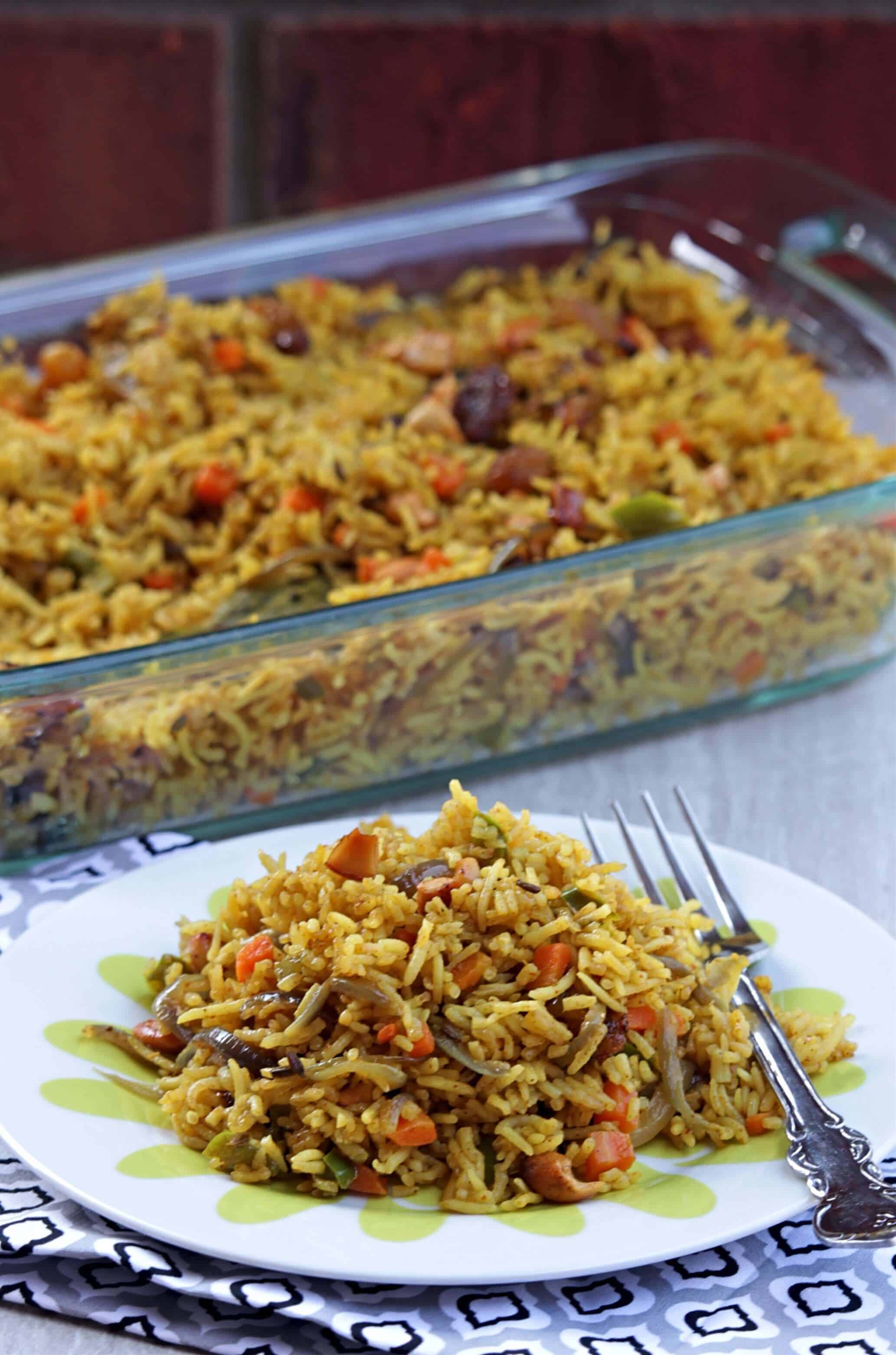 Vegetable Biriyani in a plate and a casserole