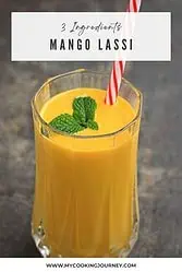 Mango lassi with straw and mint garnish and text overlay.