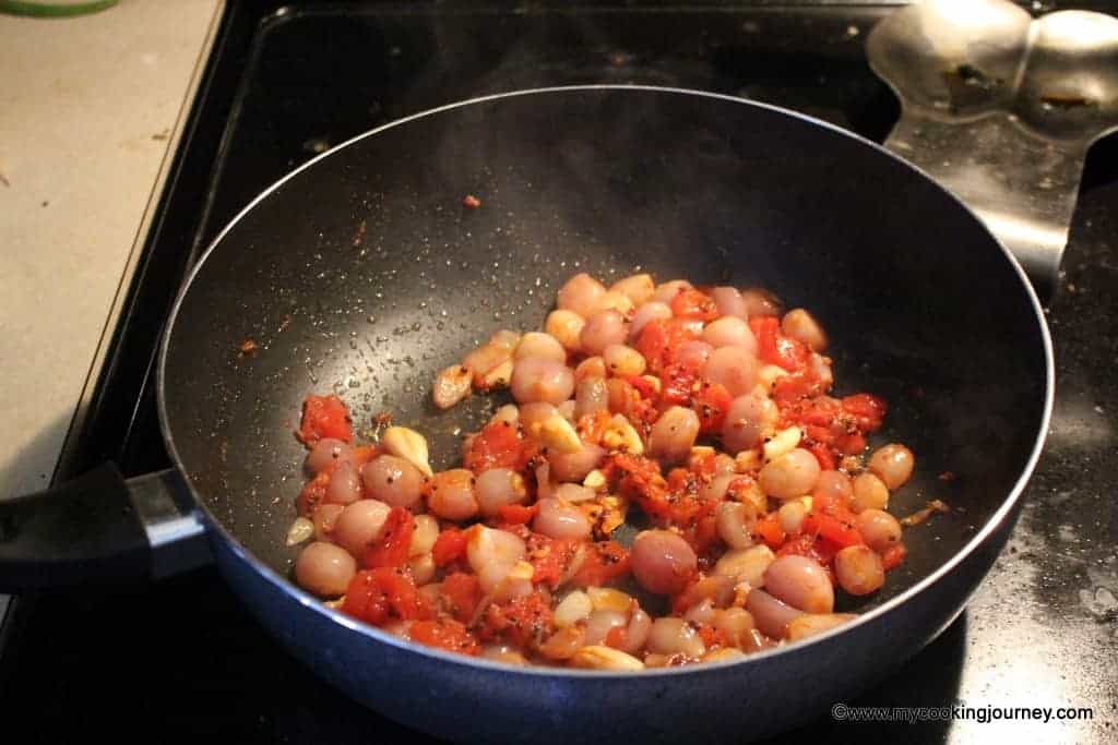 Cooking tomatoes in a pan
