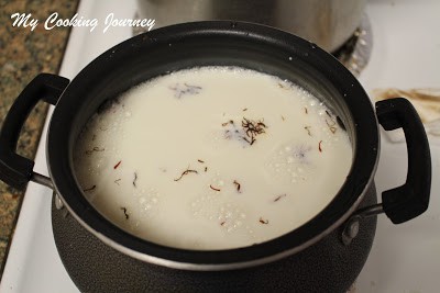 Cooking the sheer khorma in a pot