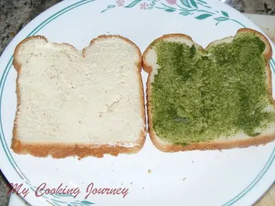 Spreading the chutney on bread