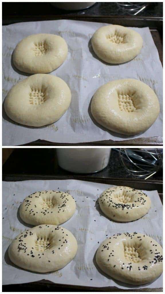 Sprinkling sesame seeds on top of the Uzbek flatbread dough