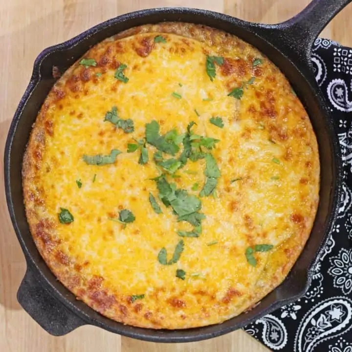 Mexican tortilla pie in a cast iron skillet