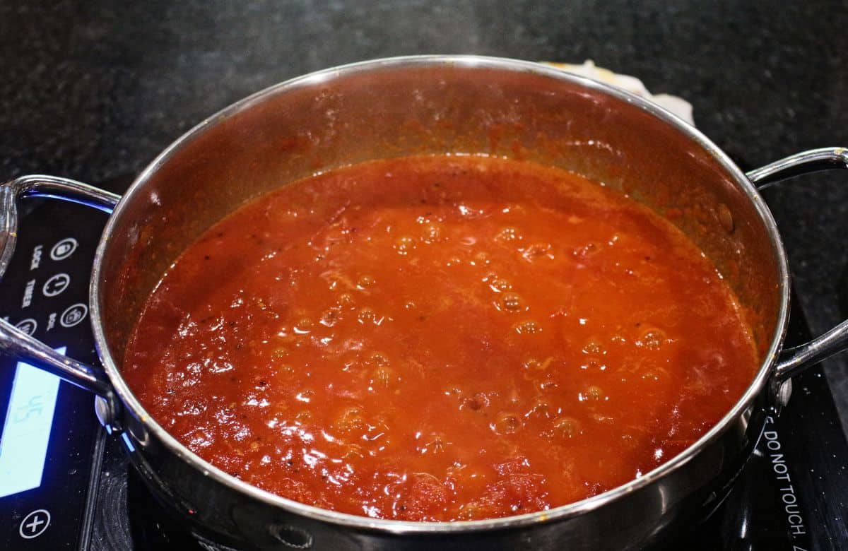 tomatoes cooking in a pan