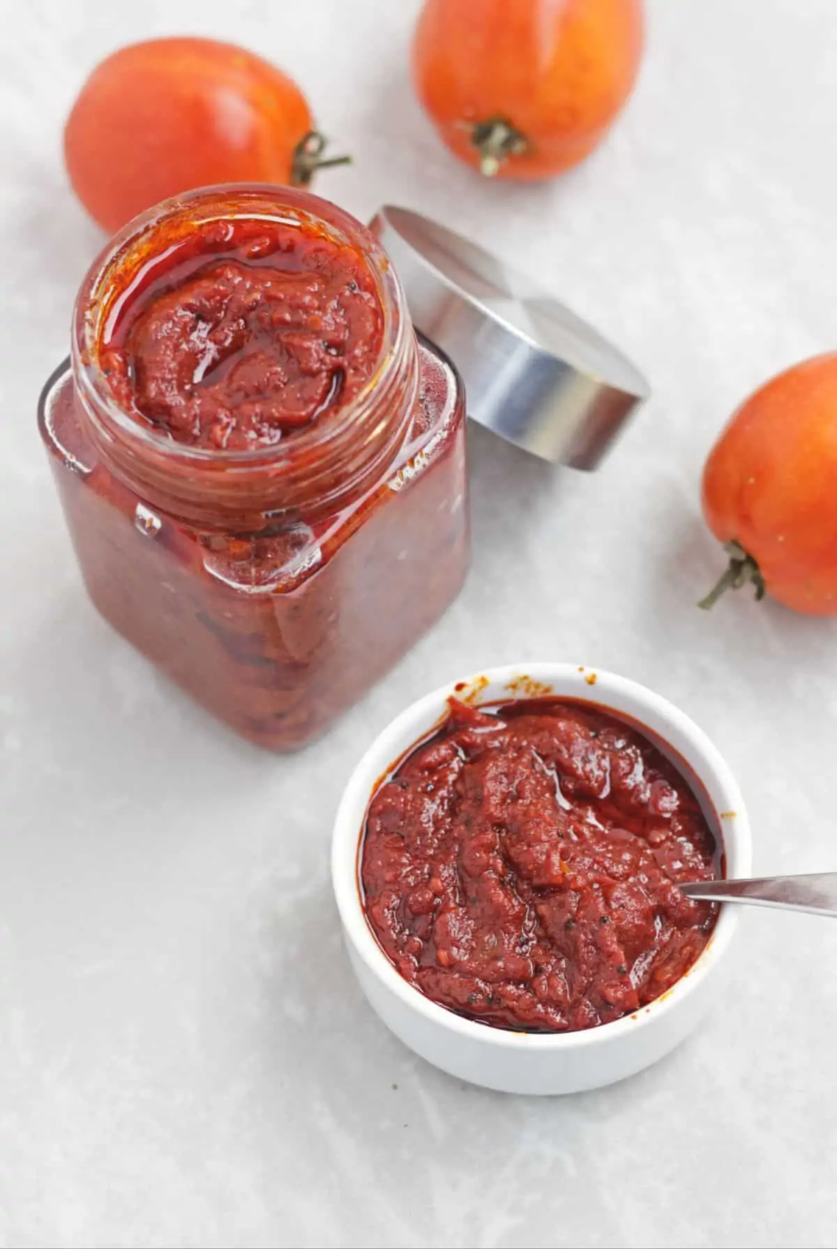 tomato pickle in a bowl and jar