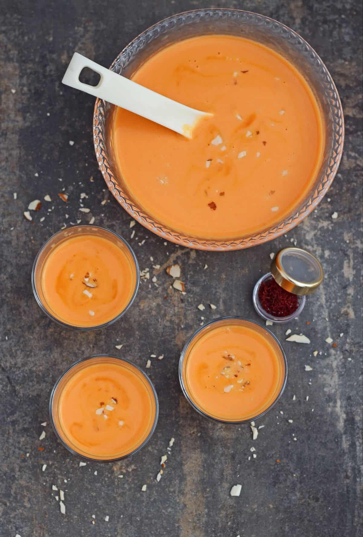 carrot kheer in bowl and glasses