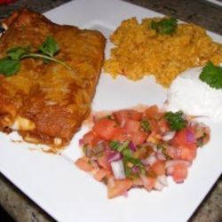 Black Bean Enchilada Served with cream in a plate