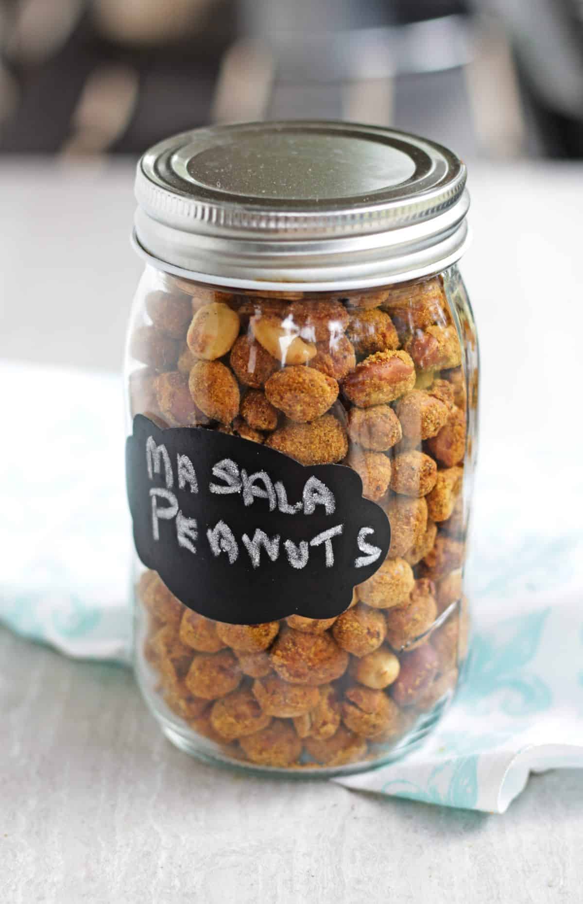 crispy peanuts in a mason jar labeled