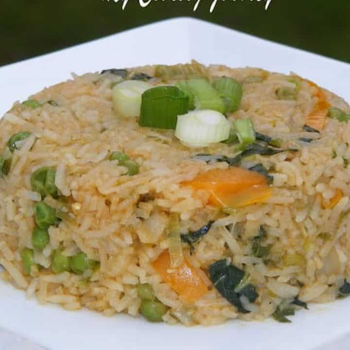 Bok choy fried rice in a white plate - featured Image