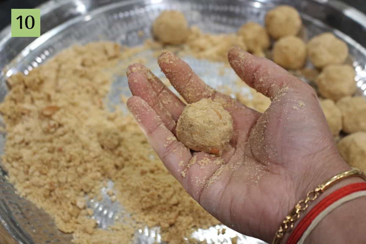 shaping ladoo by hand.
