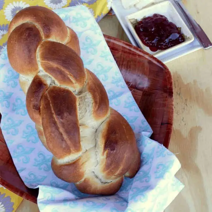 Zopf - Swiss Braided bread in a bread basket - Featured Image.