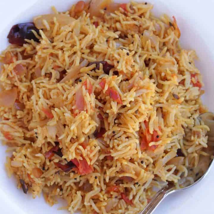 Instant pot tomato biriyani in a plate - Featured Image
