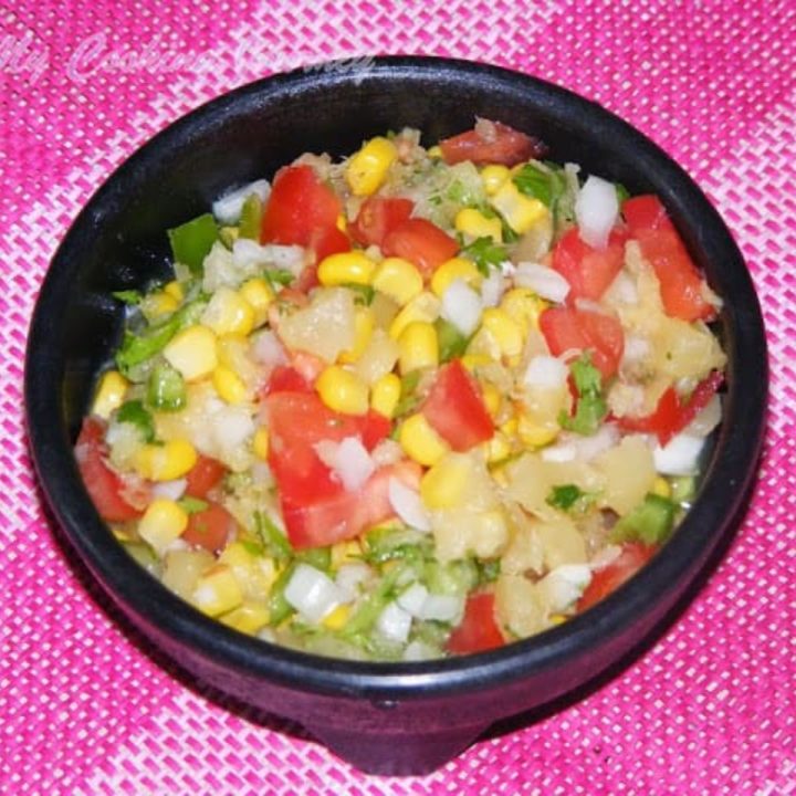 Corn Pineapple Salsa in a black bowl - Featured Image