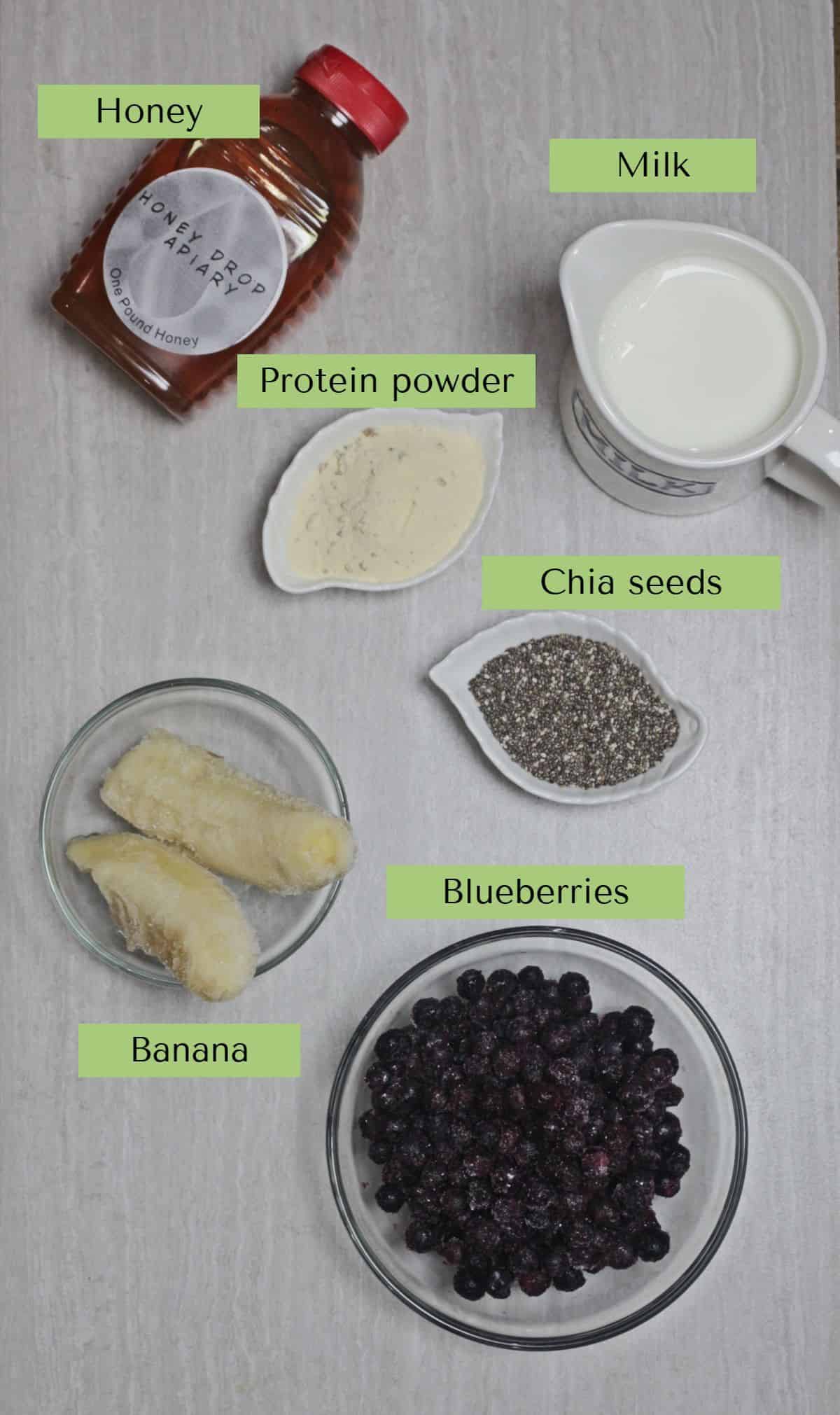 Ingredients needed to make banana blueberry smoothie.