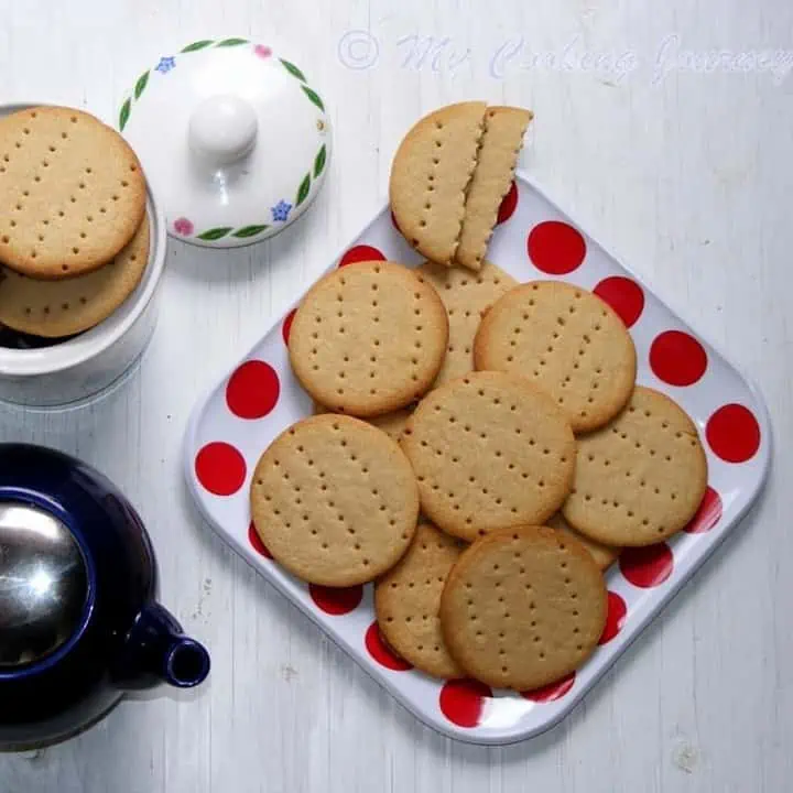 English Digestive Cookies in a white plate and jar - Featured Image