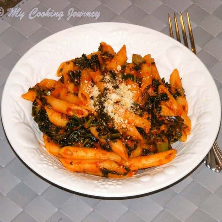 Kale and Tomato Pasta in a white bowl