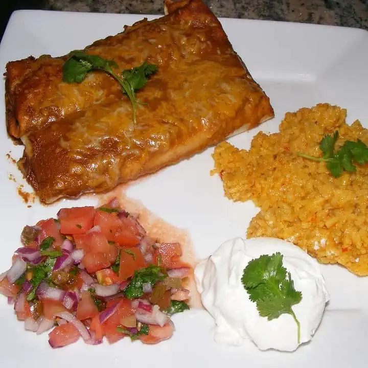 Black Bean Enchilada with sides - Featured Image