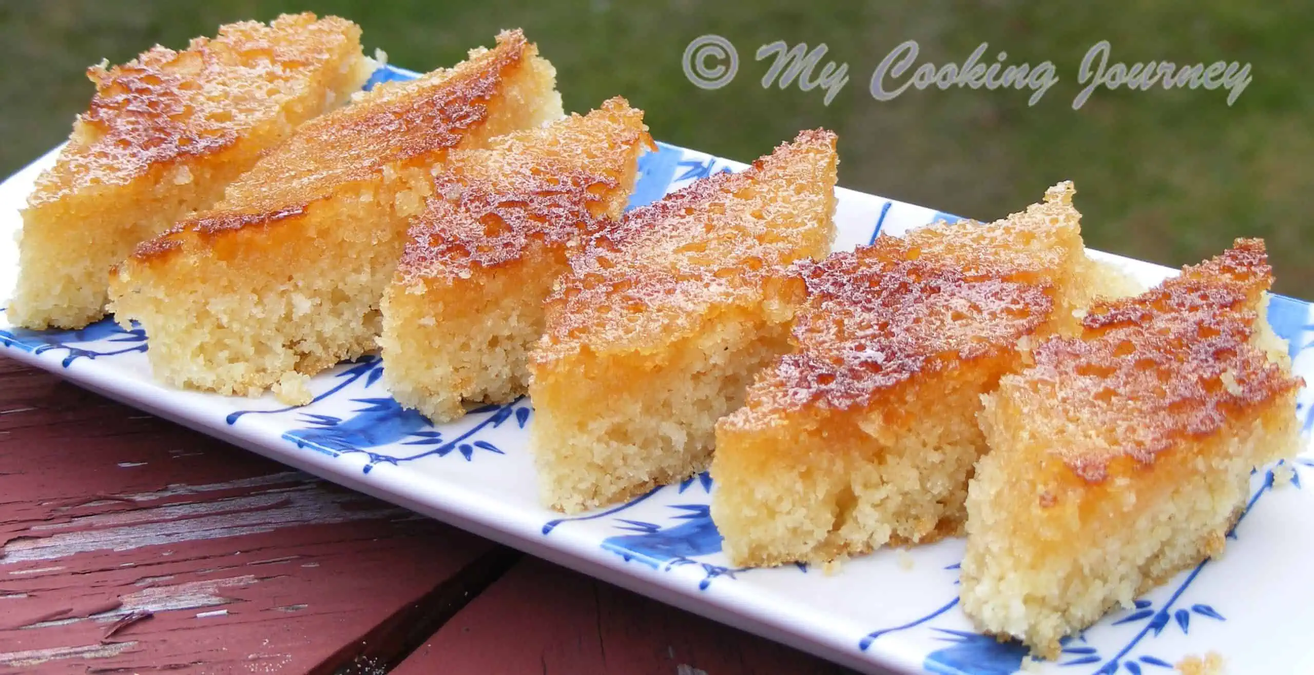 Honey Drizzled Semolina  cake in a white plate