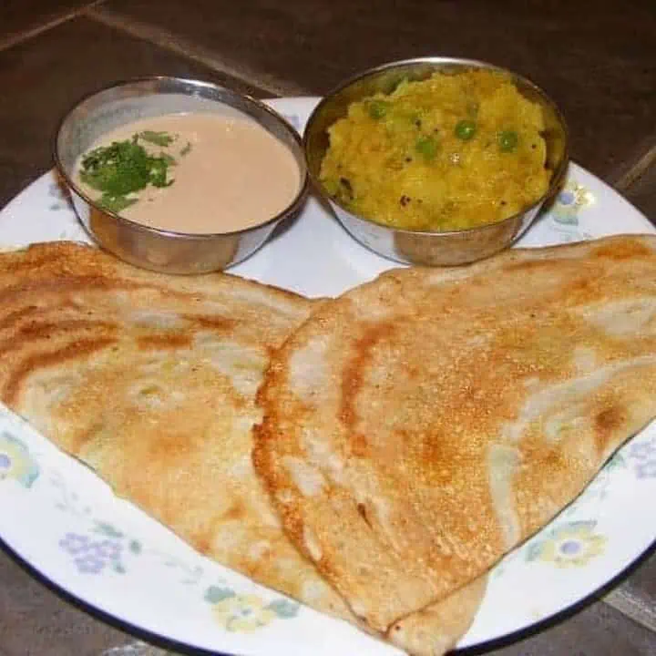 Masala Dosai with peanut chutney and masala on the side - Featured Image