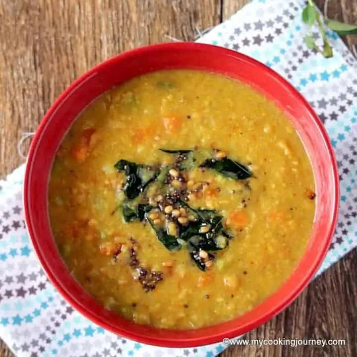 Mixed Vegetable Poricha Kuzhambu in a red bowl - Featured Image