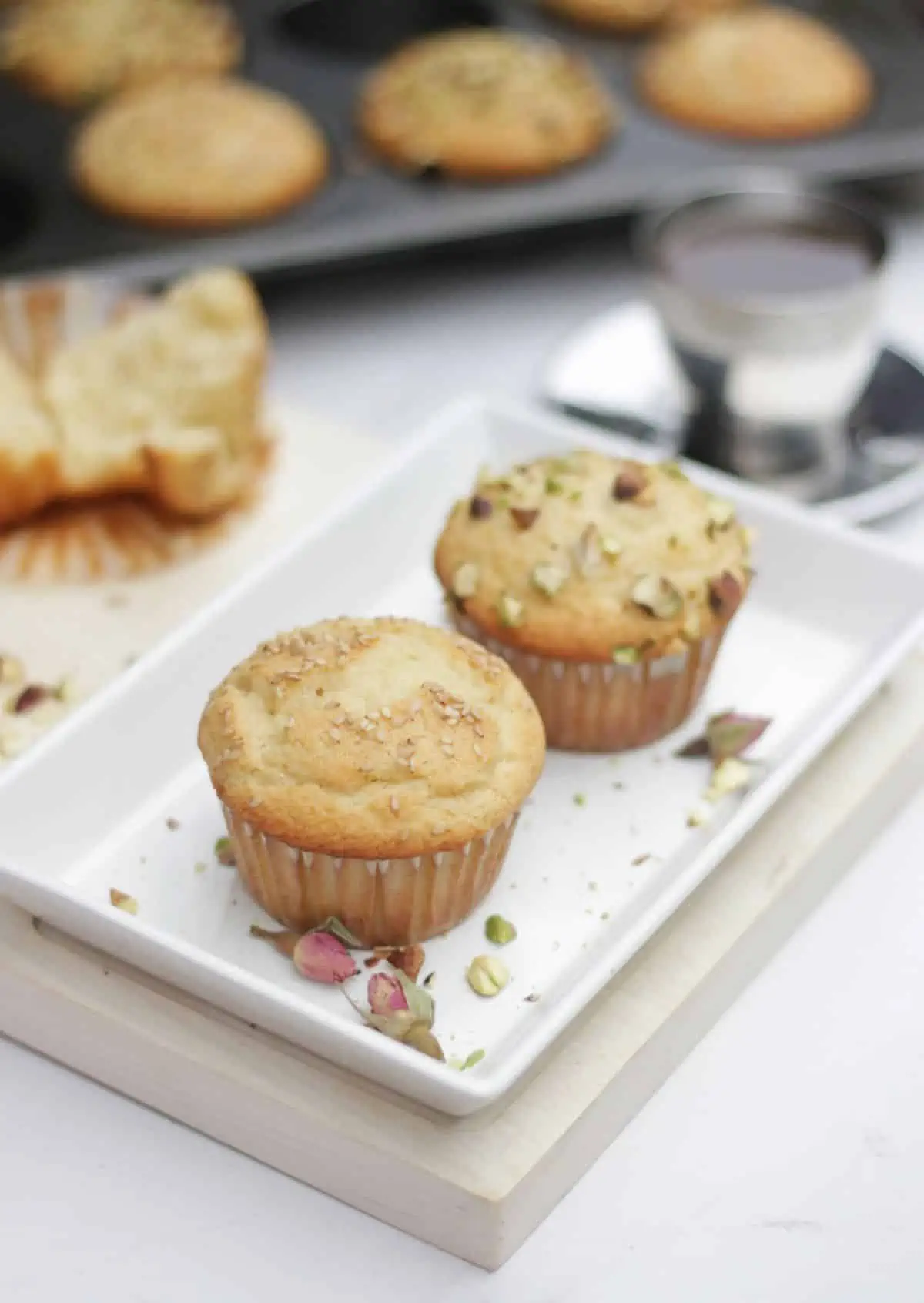 Two muffins in a plate.