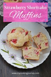 Strawberry muffins whole and sliced open with text.