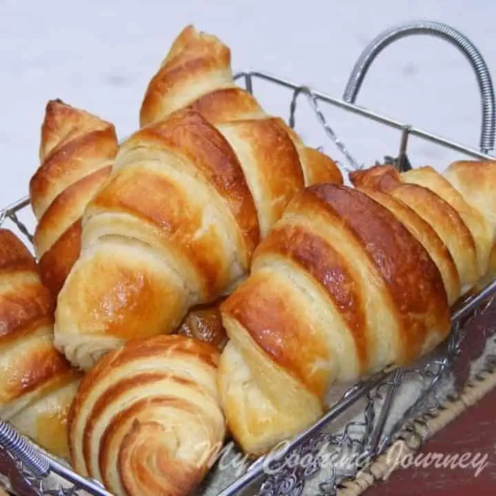 French Crossaint in a basket - Featured Image.