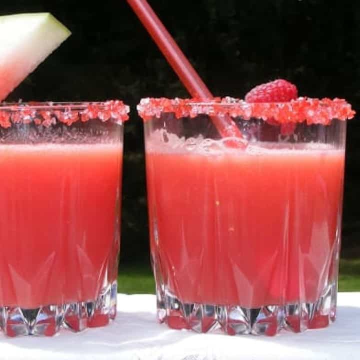 Watermelon Rasberry Lemonade in two glasses - Featured Image