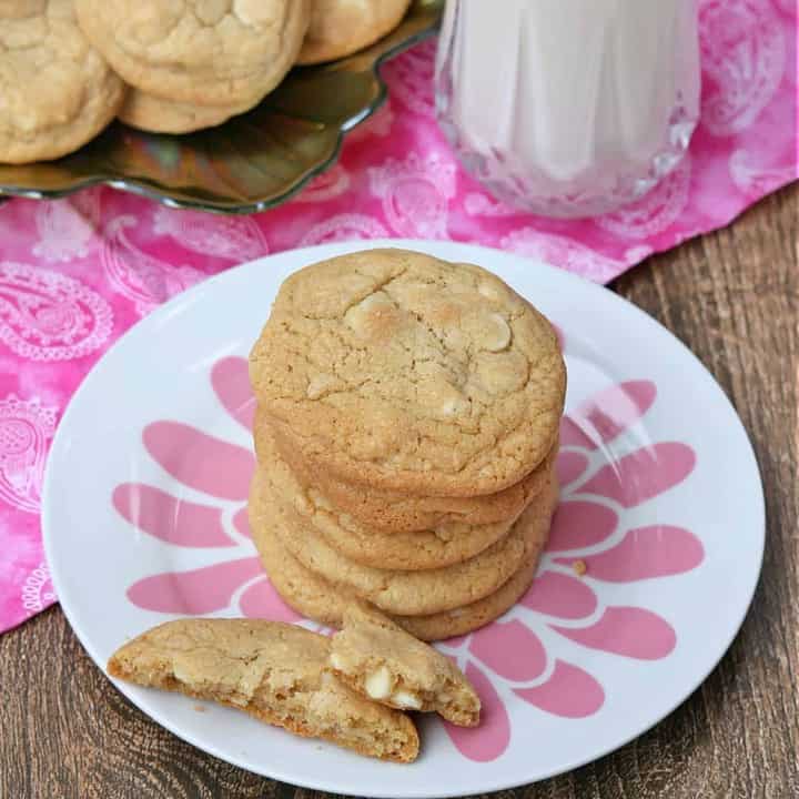 White Chocolate Macadamia Cookies stacked in a white plate - Featured Image