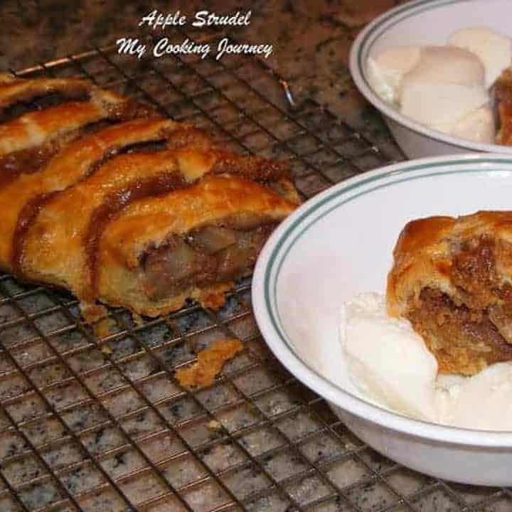 Apple Strudel with Puff Pastry on a rack and with ice cream - Featured Image