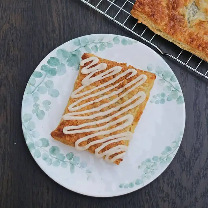 Top view of toaster strudel with drizzle for featured image.